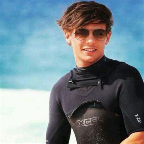 louis tomlinson wetsuit.